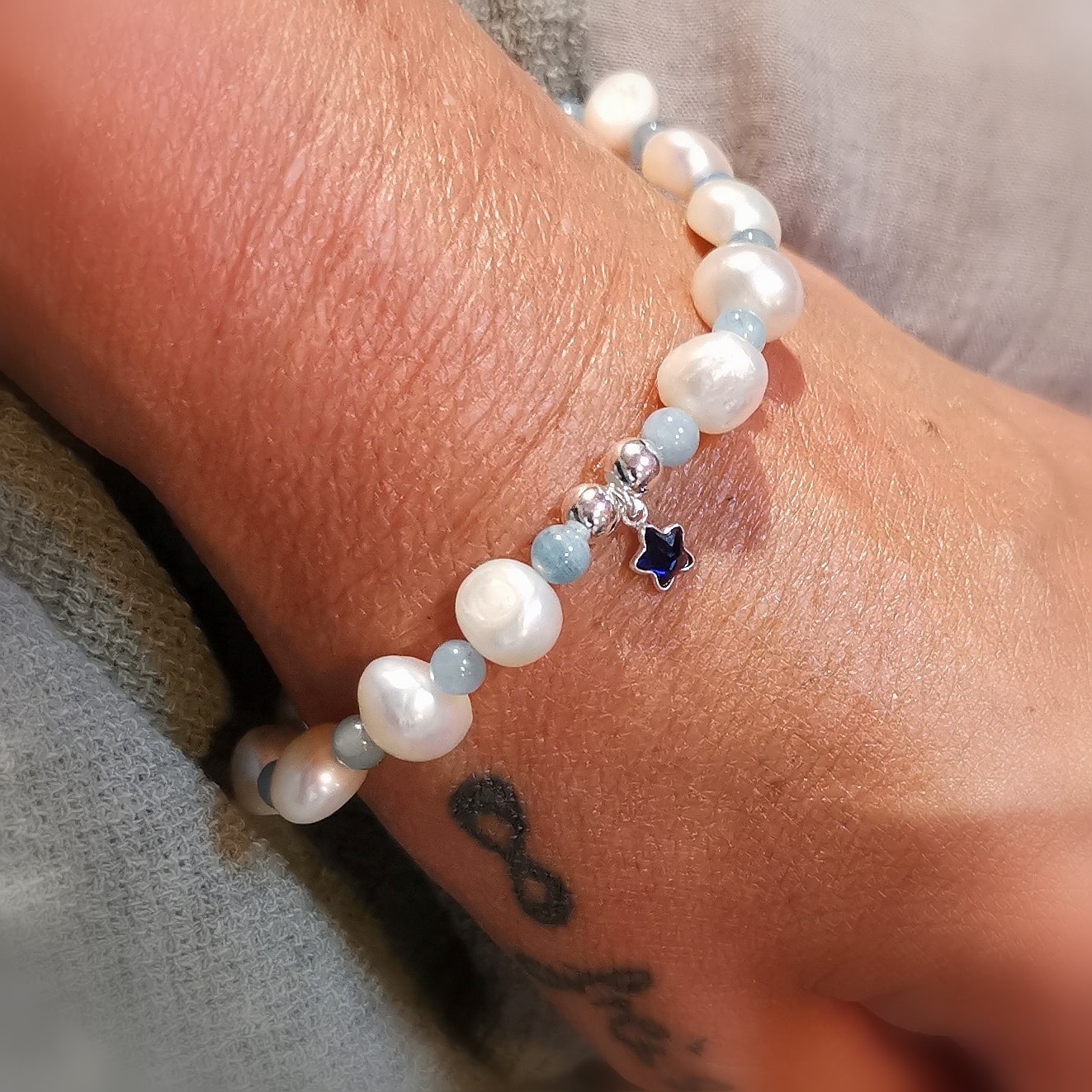 geweihtes Aquamarin Perle Edelstein Heilstein Seestern Karma Armband, Liebe und Leichtigkeit