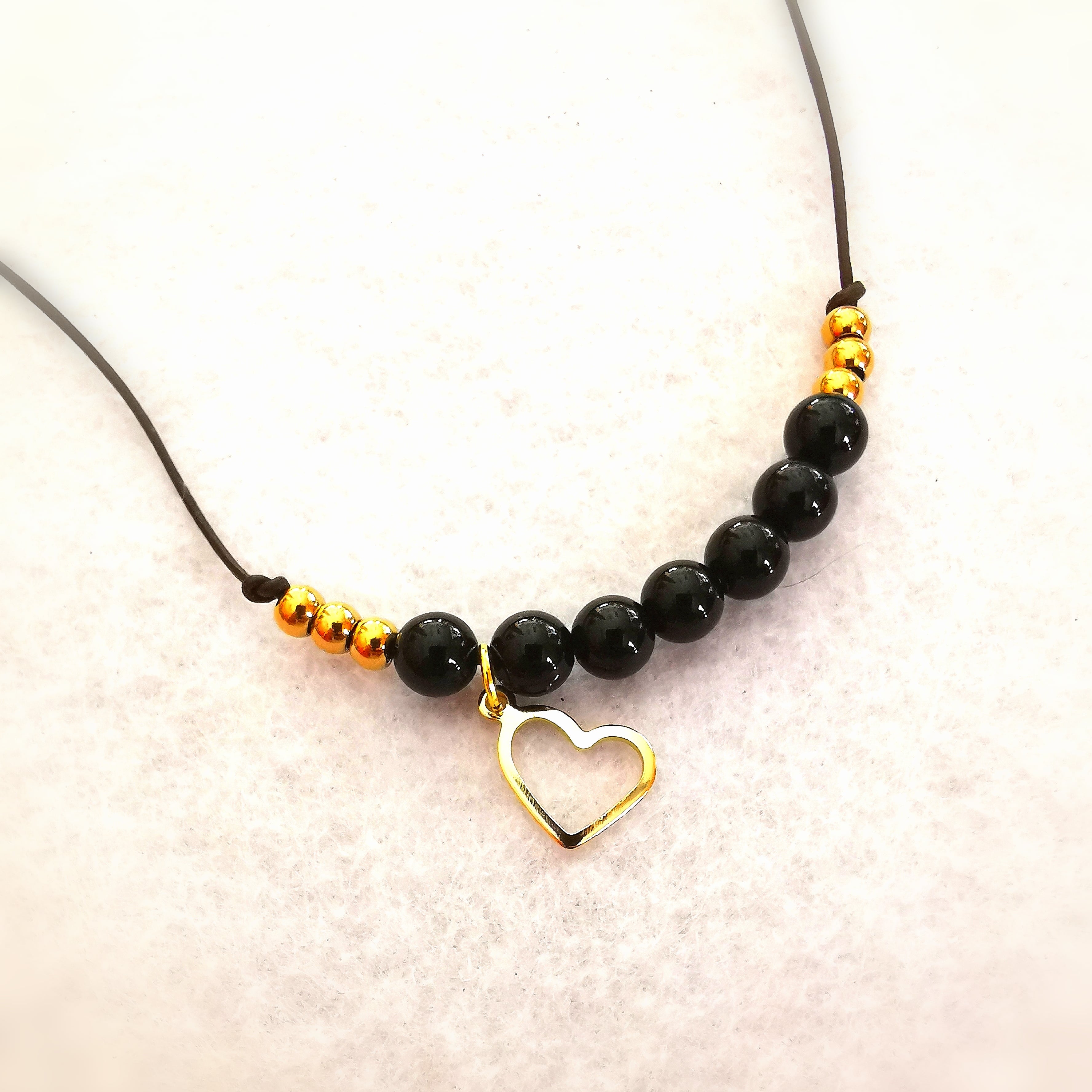 🖤 Tobillera de ónix: cuero, corazón y espíritu bohemio: consagrada para la conexión a tierra, la protección y la fortaleza del corazón.