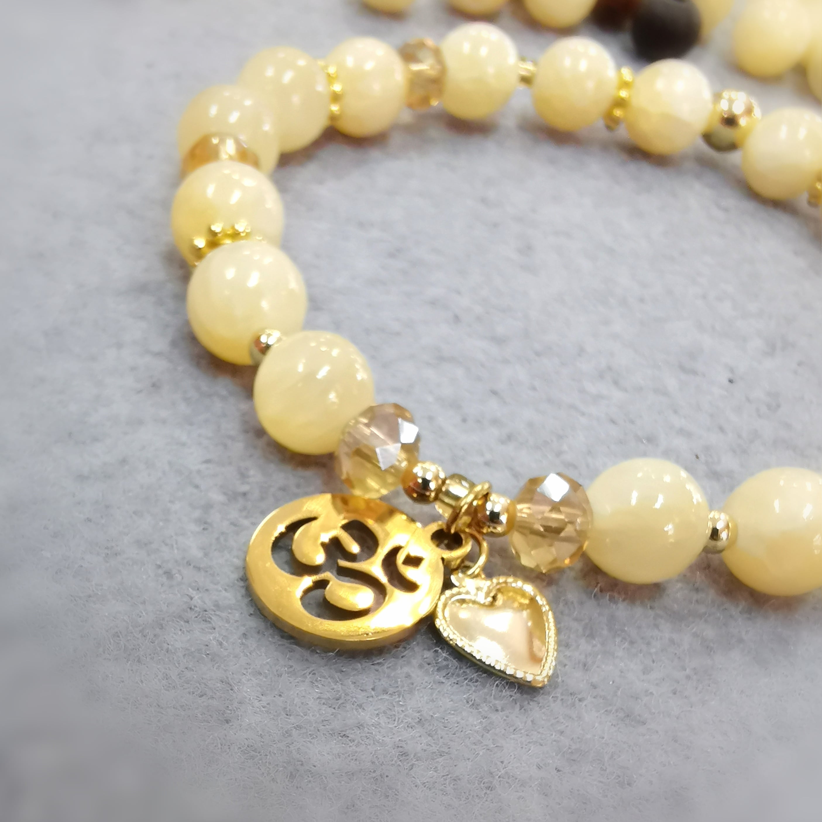 Orangencalcit Sonnenlicht OM Herz Armband, Karma Edelstein geweiht – innere Mitte