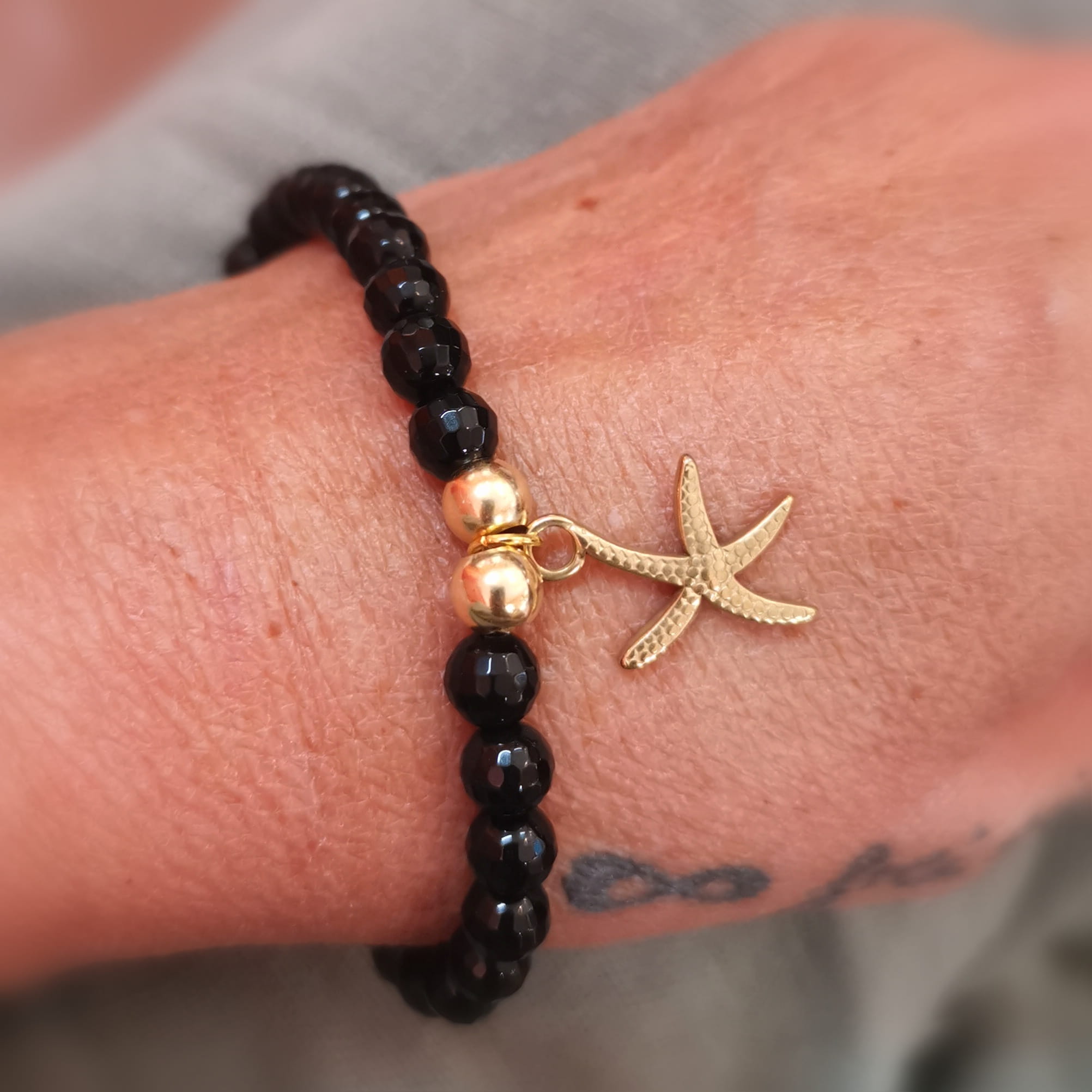 Onyx Edelstein Karma Edelstein Armband mit Seestern – für Schutz, Vertrauen & Wunder