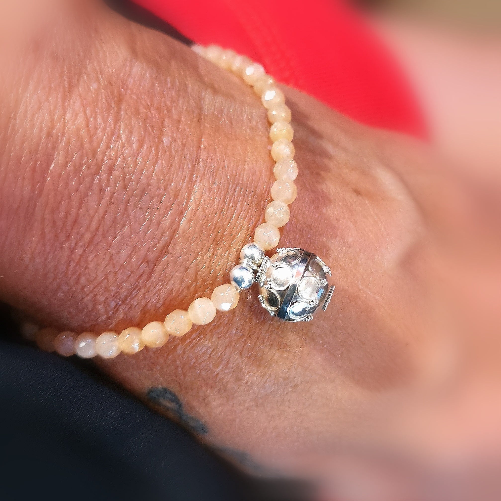 Engelsrufer Klangkugel Sonnenstein Edelstein Heilstein Karma Armband, geweiht - Lebensfreude