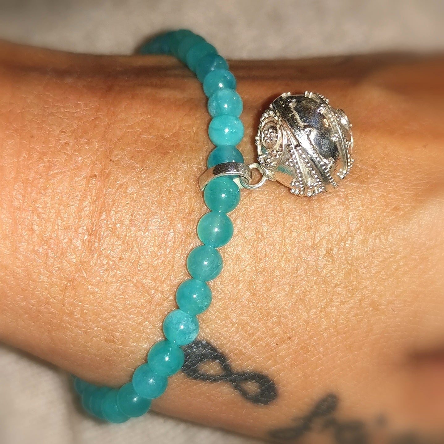 Engelsrufer Planeten Klangkugel mit Amazonit Edelstein Heilstein, Karma Armband geweiht, anti stress