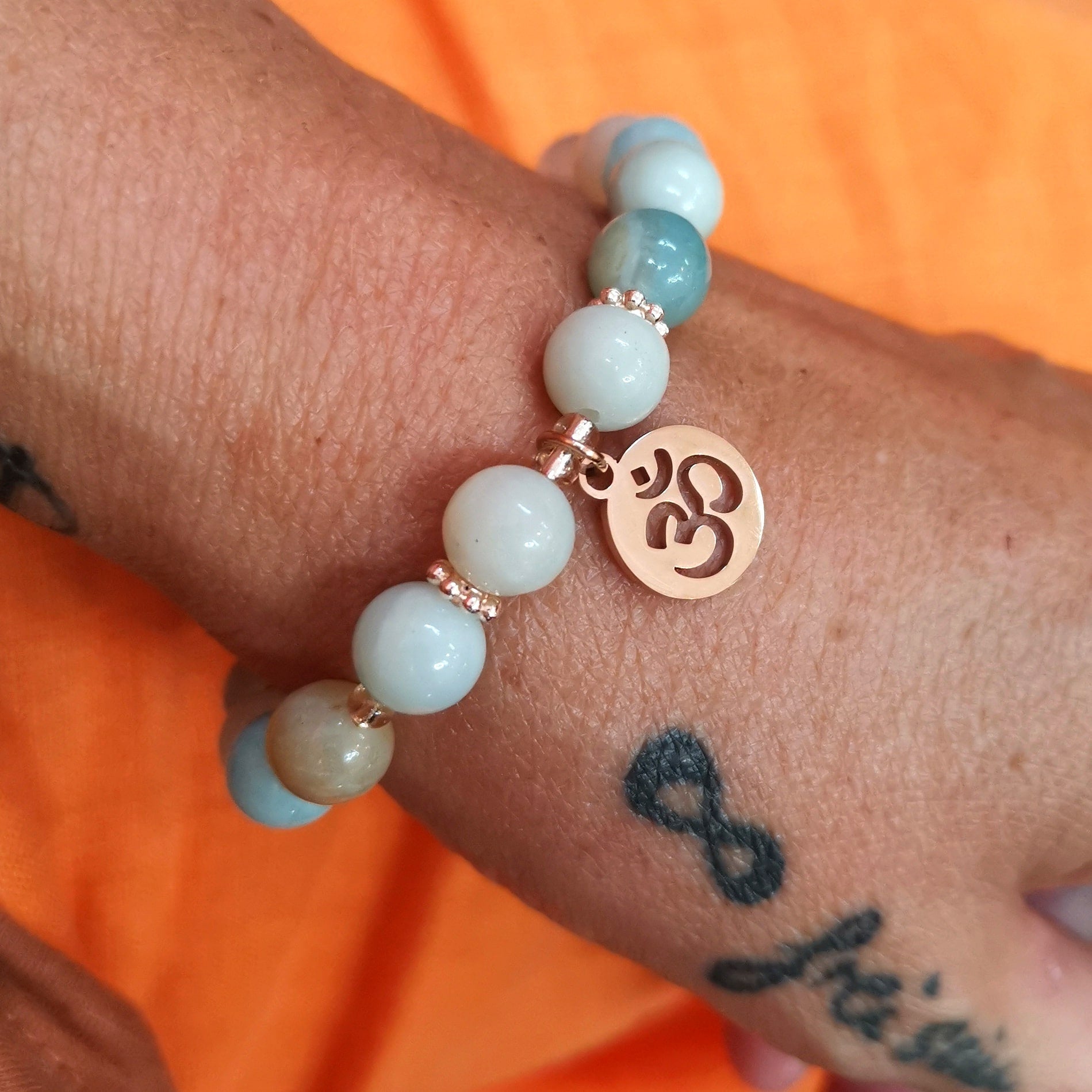 🕉️ Amazonit Karma Armband mit OM – geweiht für Klarheit, Ausdruck & innere Ruhe