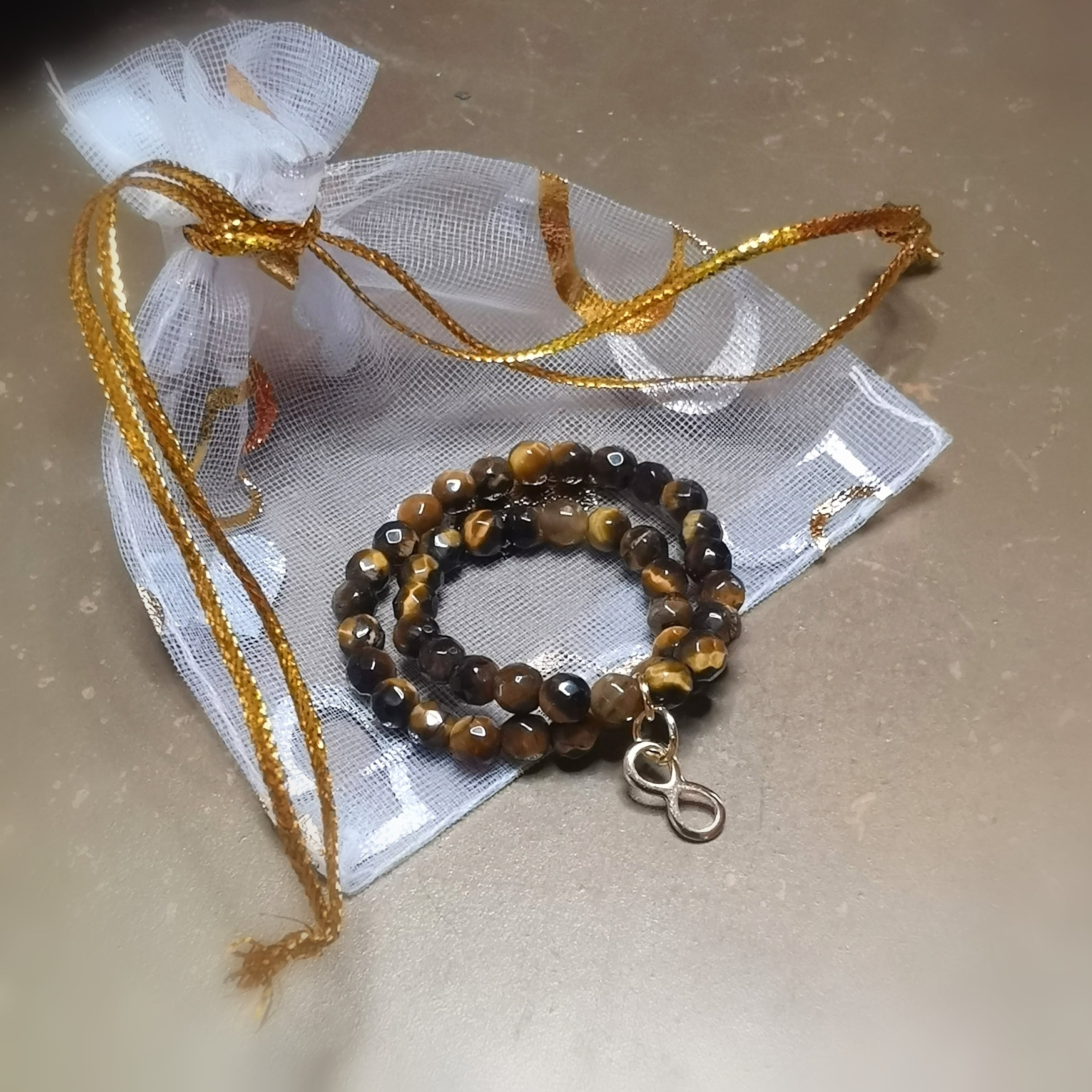 Tigerauge Infinity Edelstein Armband – für Mut, Harmonie & Solarplexus-Flow