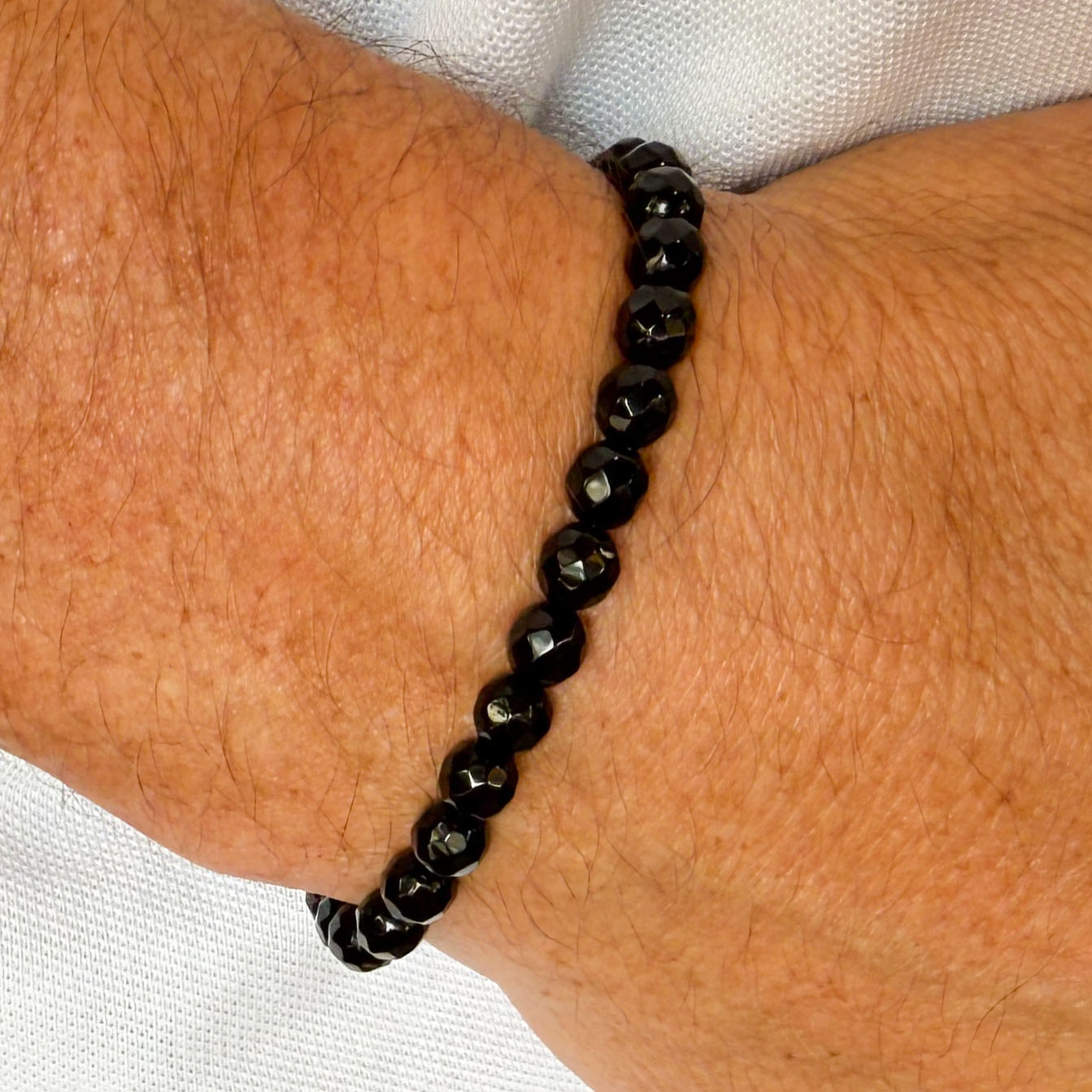 Onyx Edelstein Heilstein Armband 6 mm Perlen schwarz facettiert - Schutz