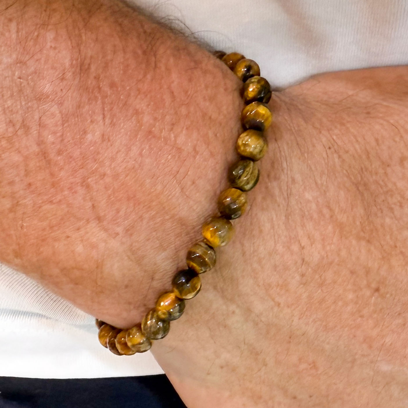 Tigerauge Edelstein Armband facettiert 6 mm – Mut, Ausstrahlung & Stabilität