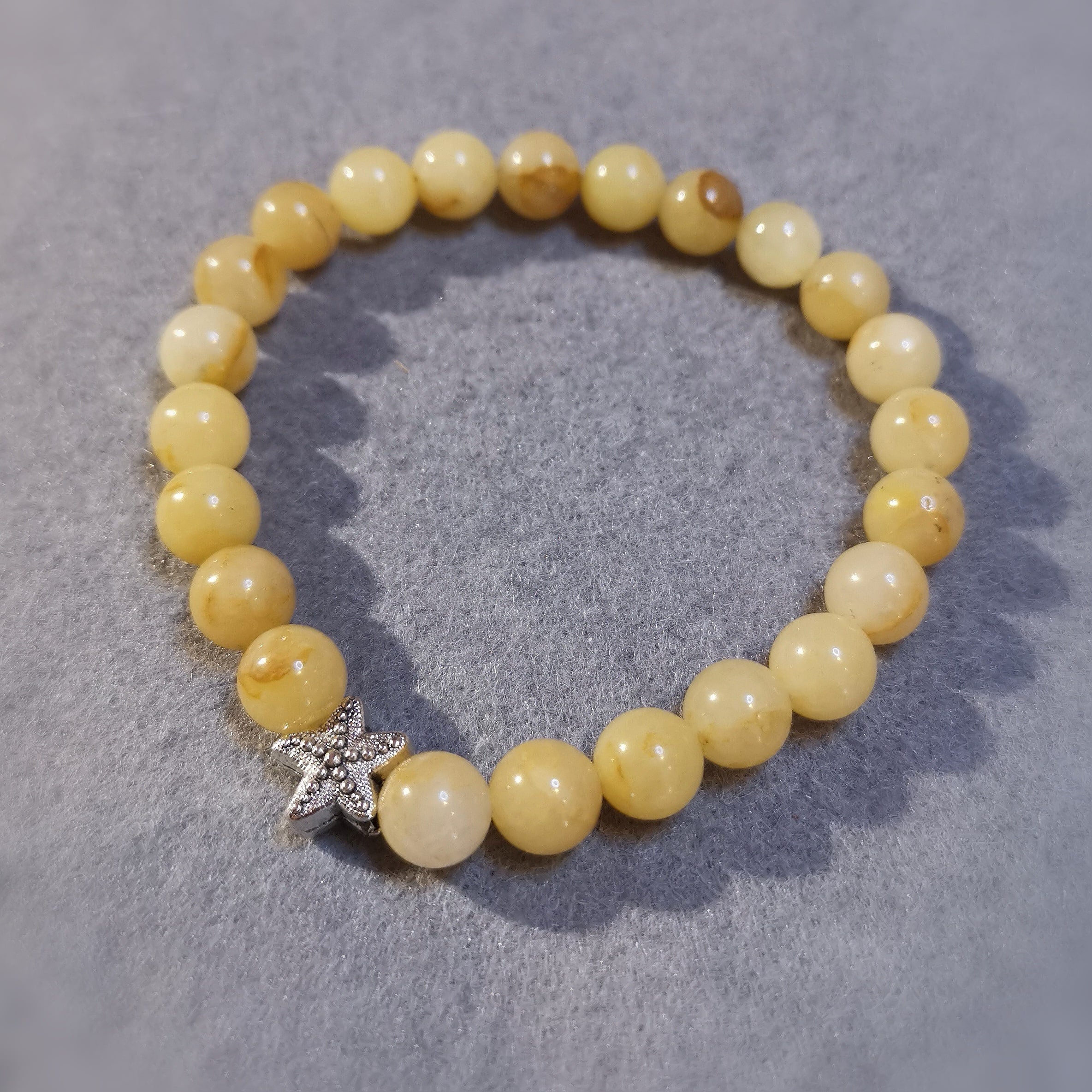 geweihter gelber Jaspis Solarplexus Chakra Heilstein, Seestern Krafttier Karma Armband, Wunder